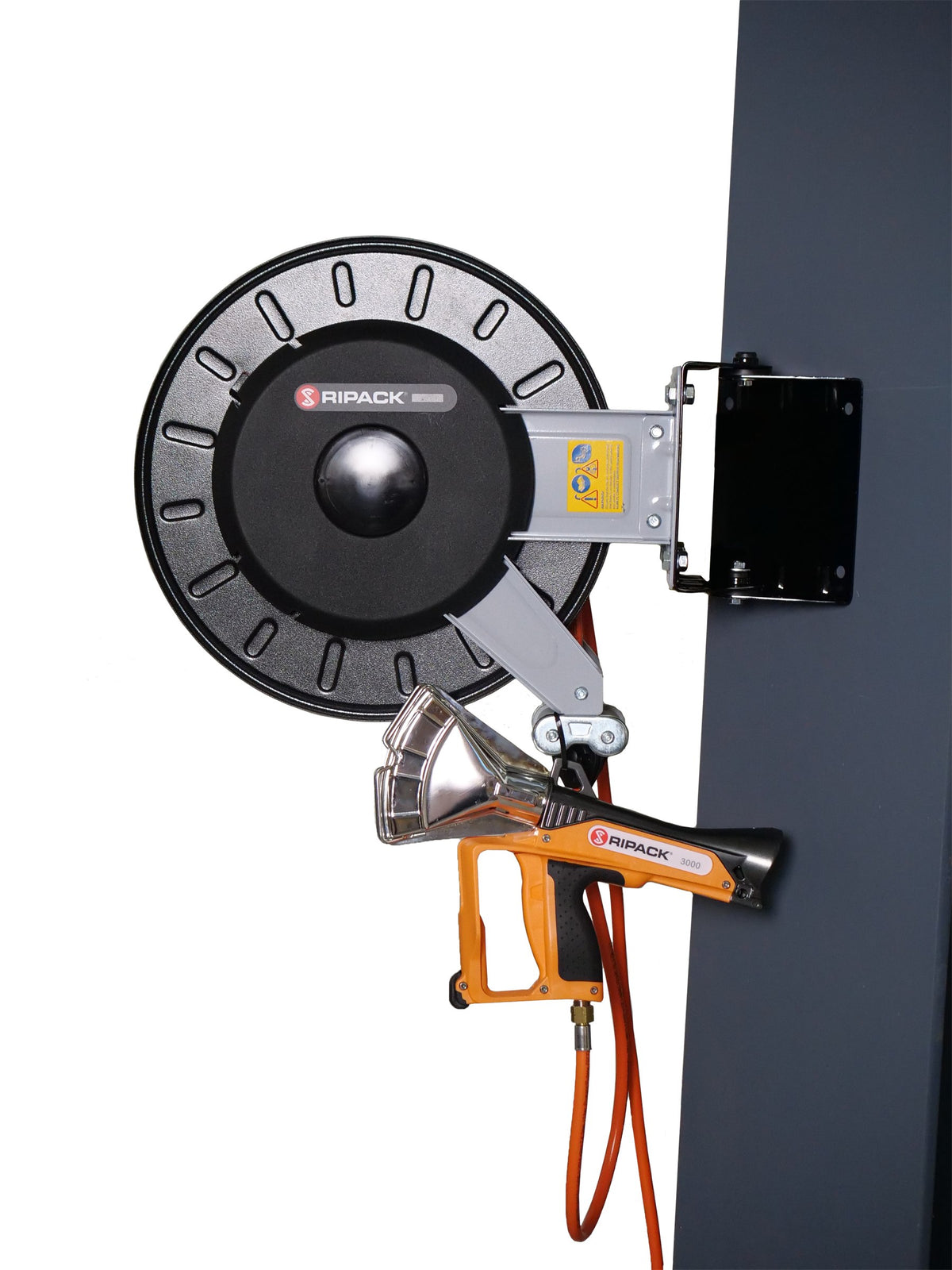 Ripack swivel hose winder wall-mounted with a heat gun hanging below