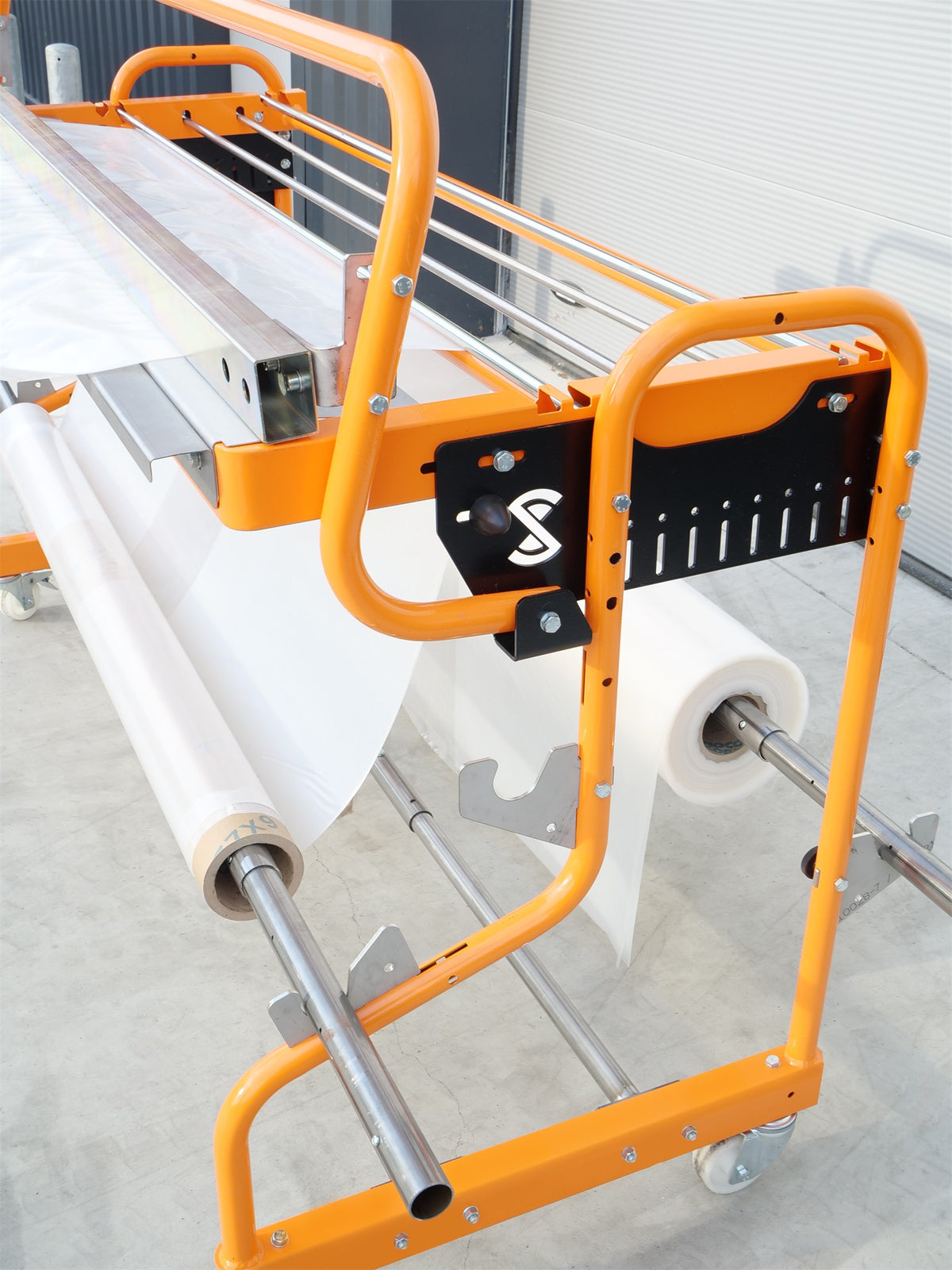 Ripack Multicover 955 sealing clamp and film rolls, side view
