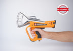 Ripack 2500 heat shrink gun held in the hand, side view