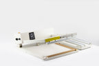 AIE L-bar shrink wrap system with L-bar raised and film rack