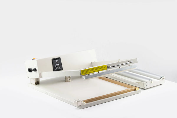 AIE L-bar shrink wrap system with L-bar raised and film rack