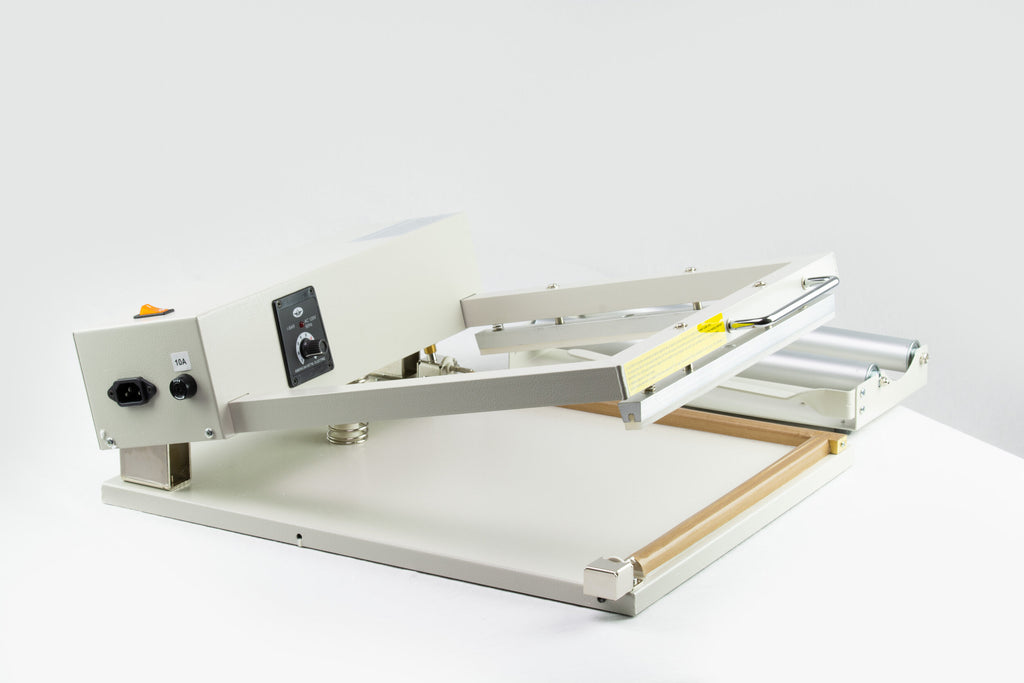 AIE L-bar shrink wrap system timer and L-bar arm, three-quarter view