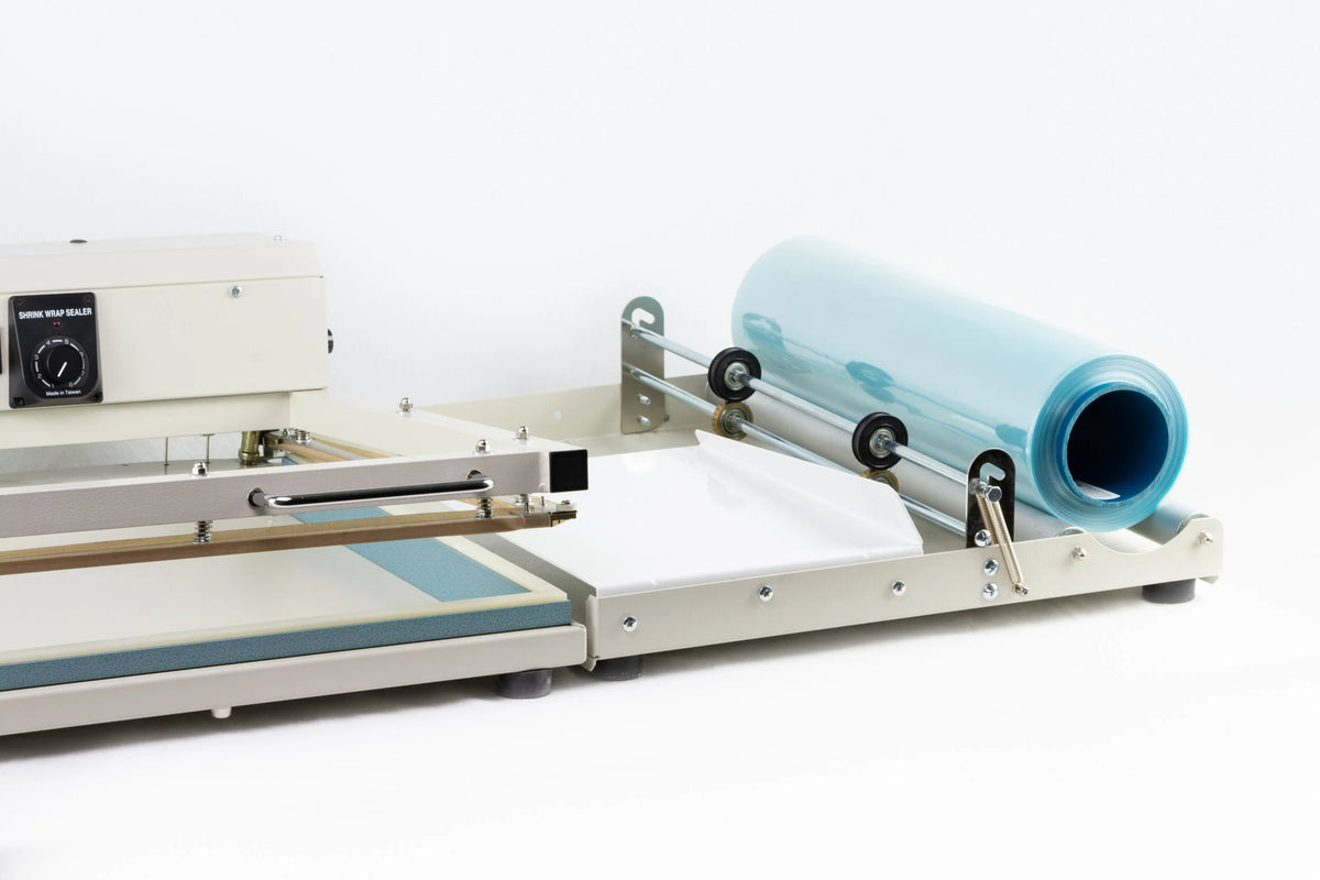 AIE L-bar shrink wrap system film rack with centerfold film roll, close-up