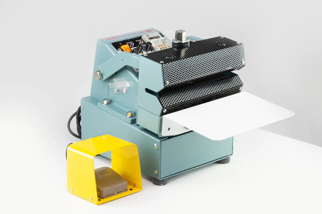AIE CA Series semi-automatic constant heat sealer, three-quarter view