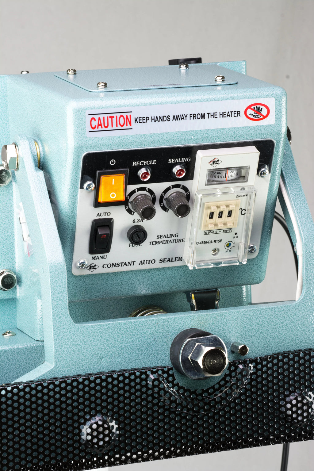 AIE CFV Series vertical constant heat foot sealer control panel with timer and temperature knobs, close-up