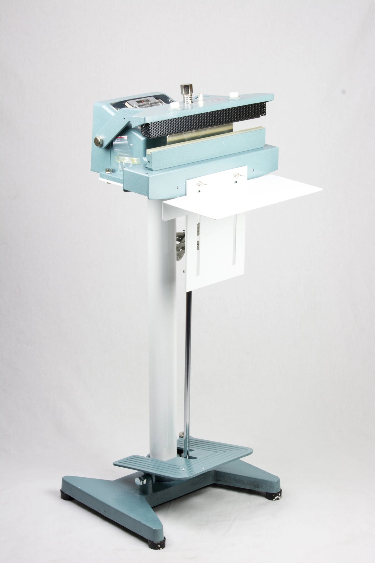 AIE-602CS 24-inch upper jaw constant heat foot sealer on stand with work table and foot control