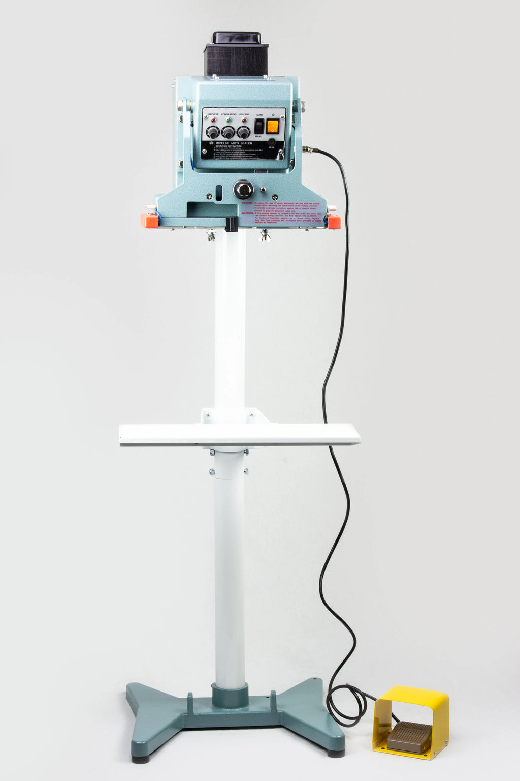 AIE FDV Series vertical double impulse foot sealer with work table and foot pedal, front view