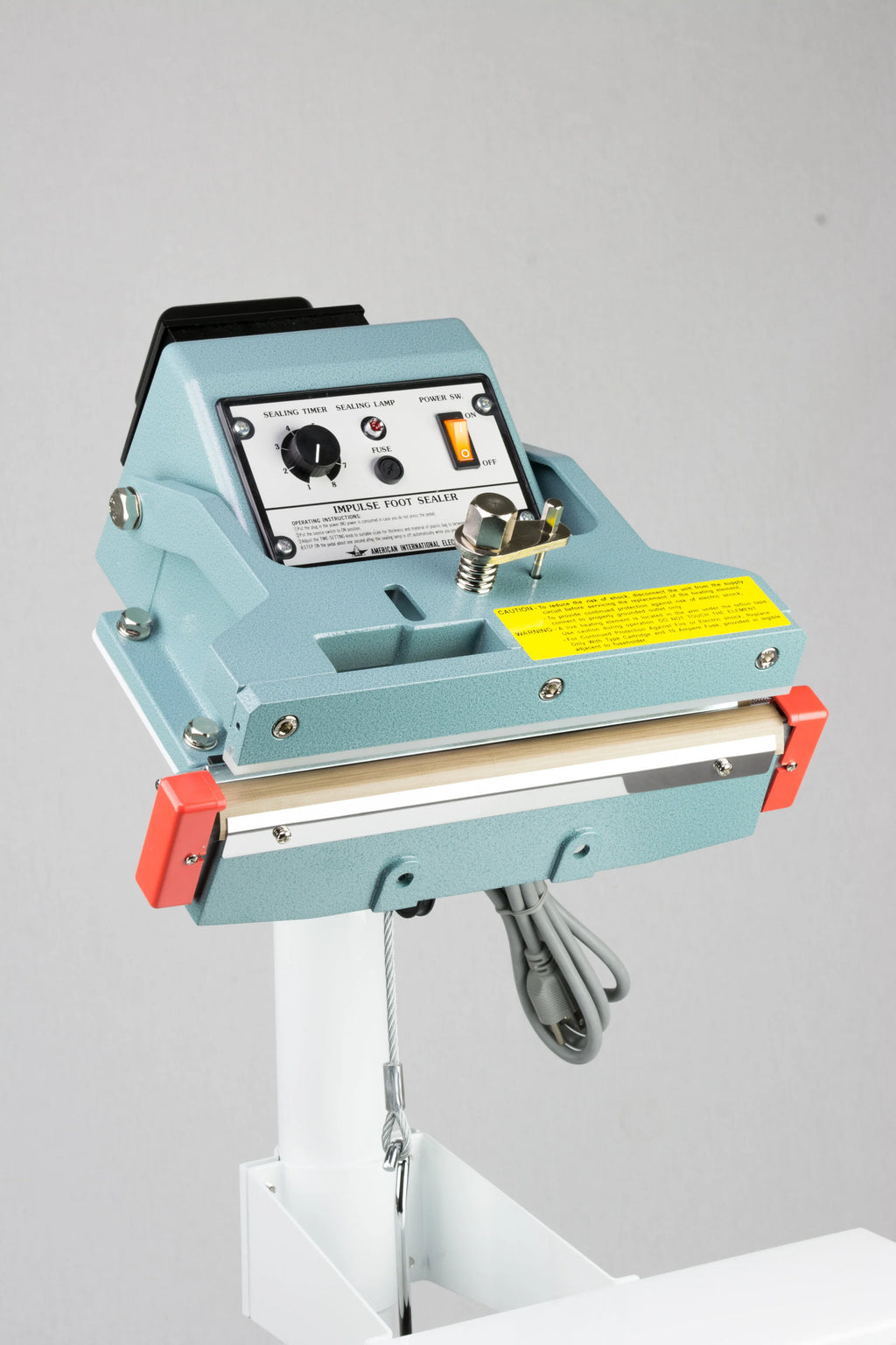 AIE FIT Series tilt angle impulse foot sealer sealing head tilted forward, close-up