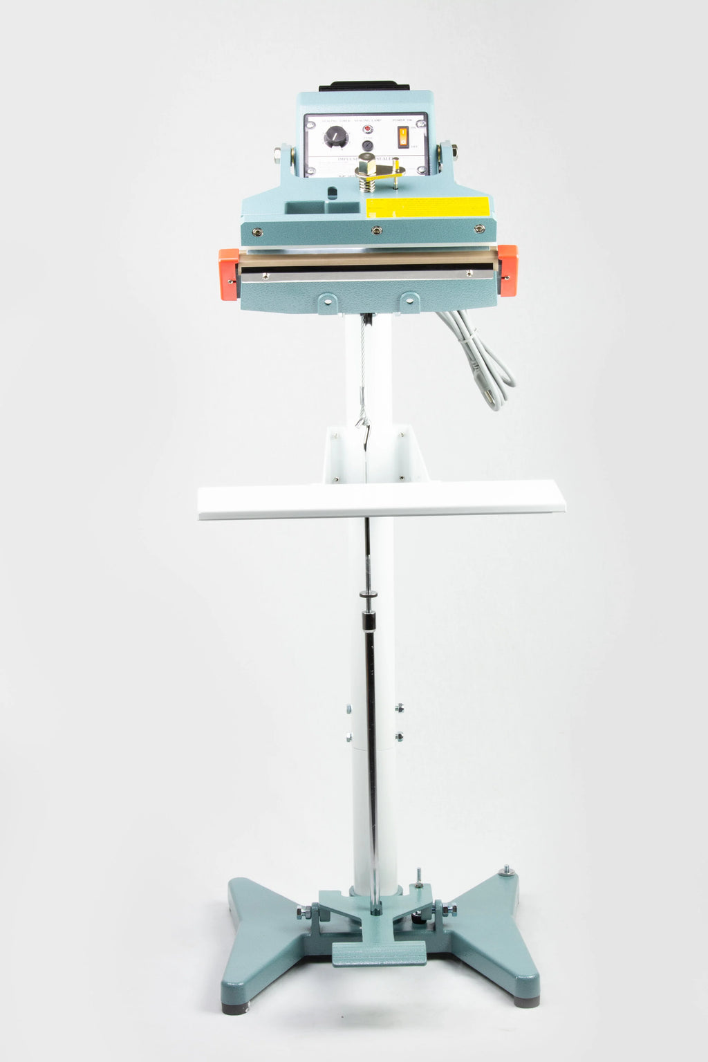 AIE FIT Series tilt angle impulse foot sealer with extended foot pedal, front view