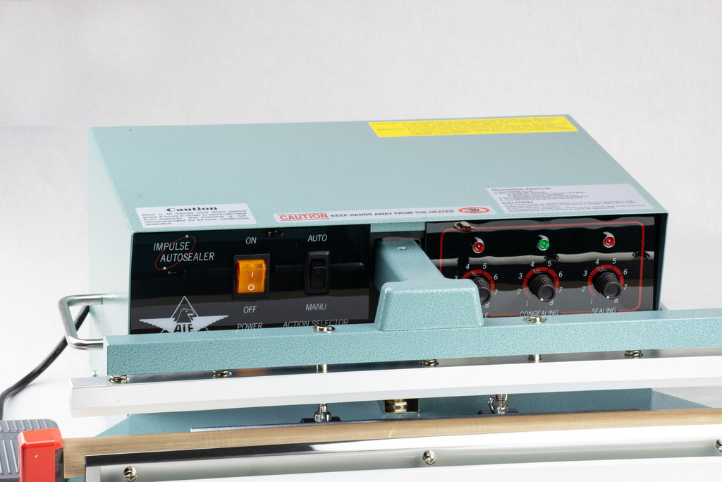 AIE A1 Series semi-automatic impulse sealer timer knobs and switches, close-up