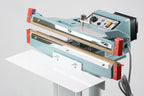 AIE FD Series double impulse foot sealer upper and lower heating jaws with work table, close-up