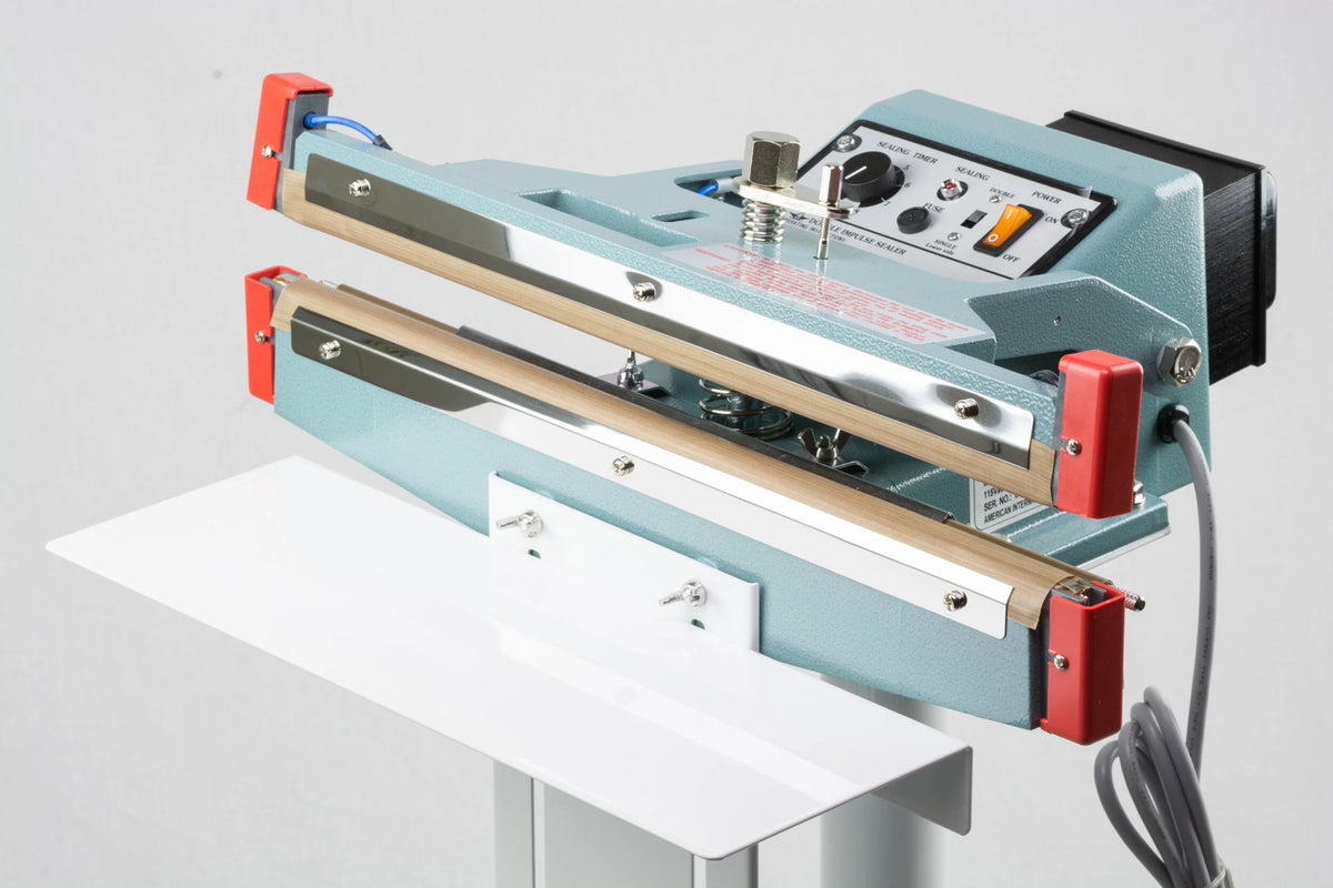 AIE FD Series double impulse foot sealer upper and lower heating jaws with work table, close-up