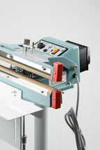 AIE FD Series double impulse foot sealer control panel and heated jaws, close-up