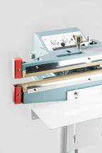 AIE600FDC 24-inch double impulse seal and trim foot sealer jaws and control panel, close-up