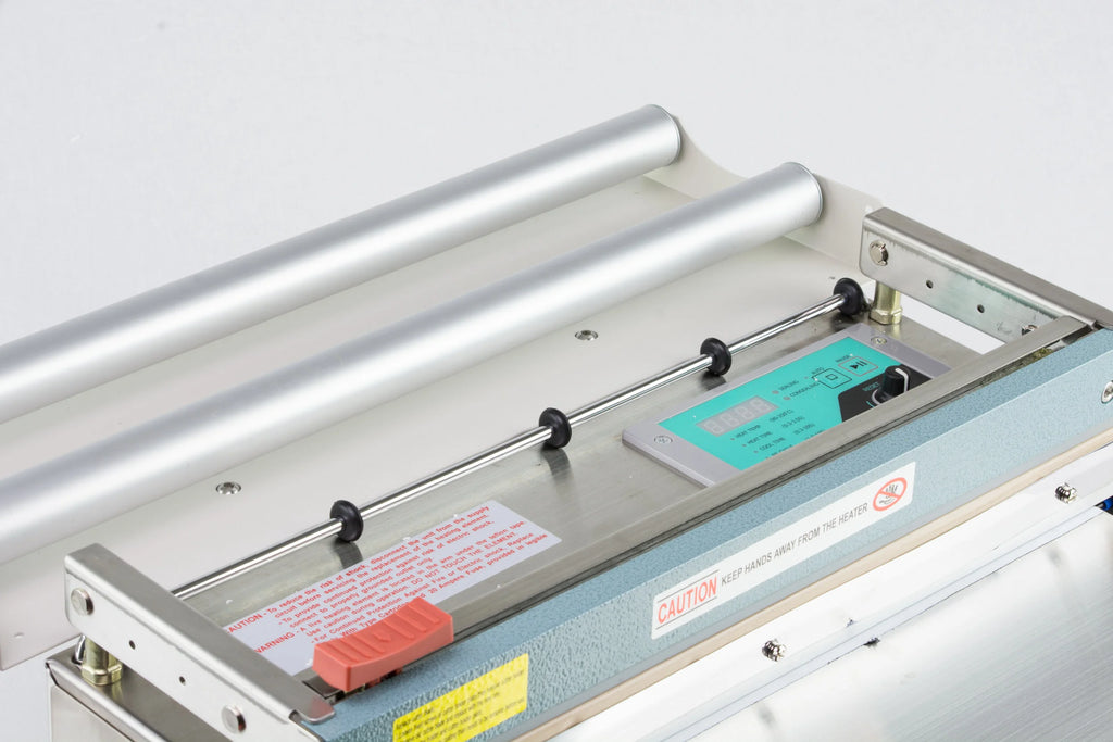 AIE455FCE stainless steel digital impulse sealer with trimmer rollers and digital controls, close-up