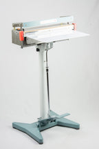 AIE FS Series stainless steel impulse foot sealer on stand with work table