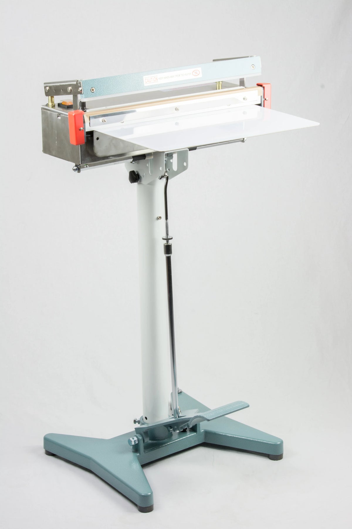 AIE FS Series stainless steel impulse foot sealer on stand with work table