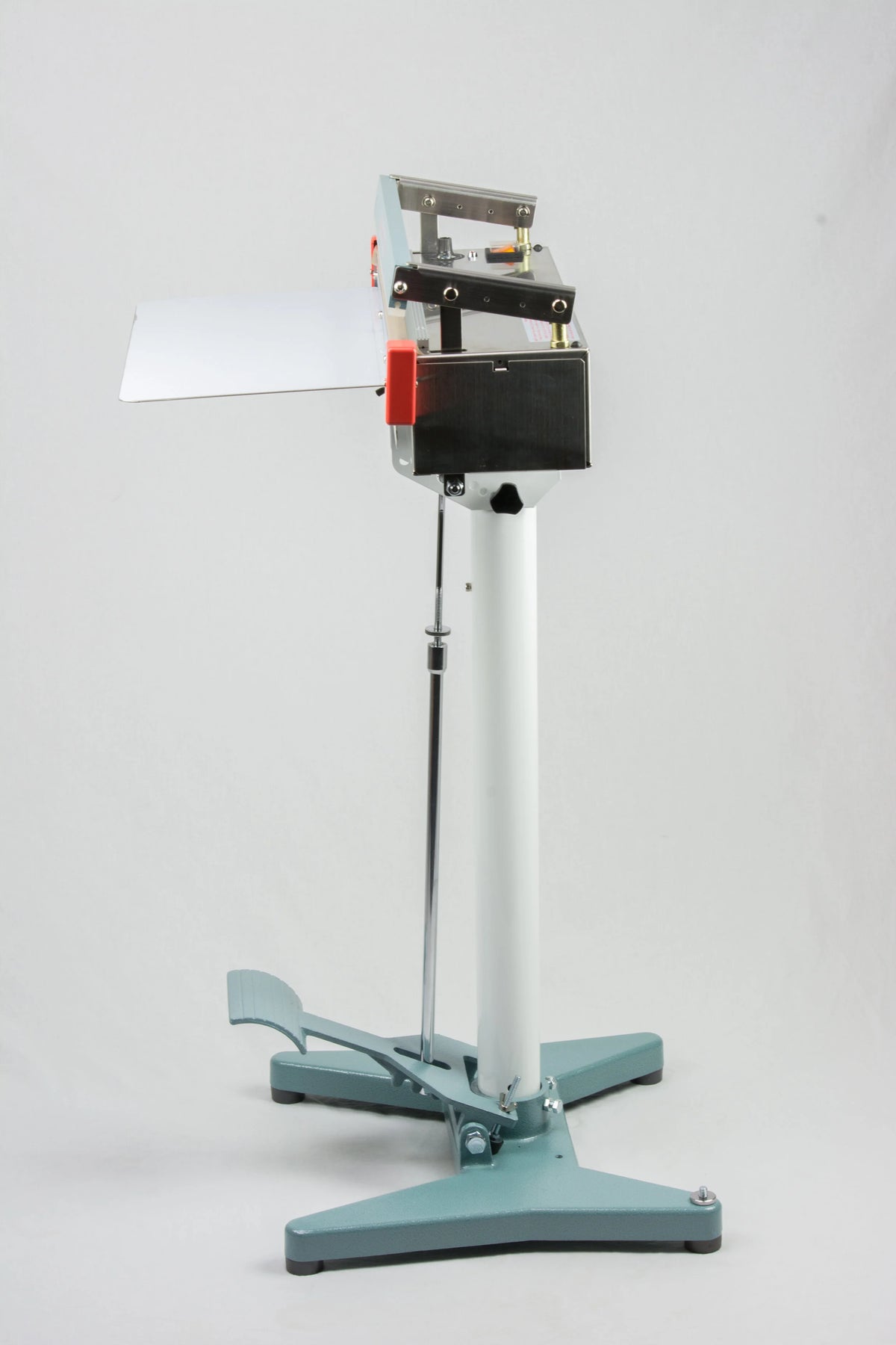 AIE FS Series stainless steel foot sealer with foot pedal, side view