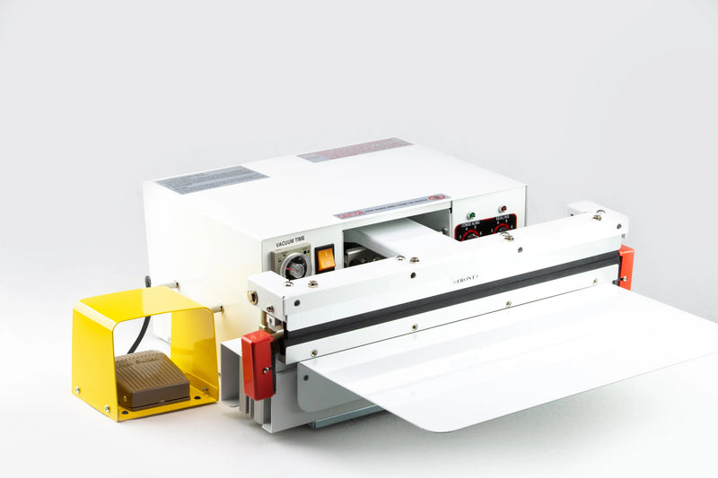 AIE VA Series nozzle vacuum impulse sealer with foot pedal and work table