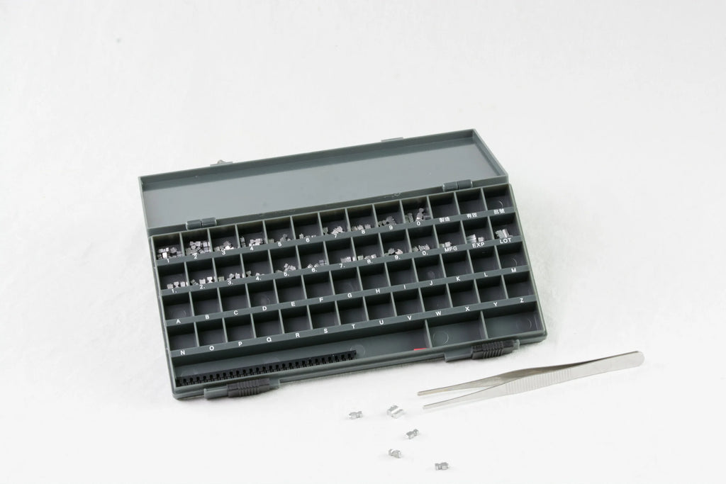 AIE-663 imprinter type set in its case with tweezers