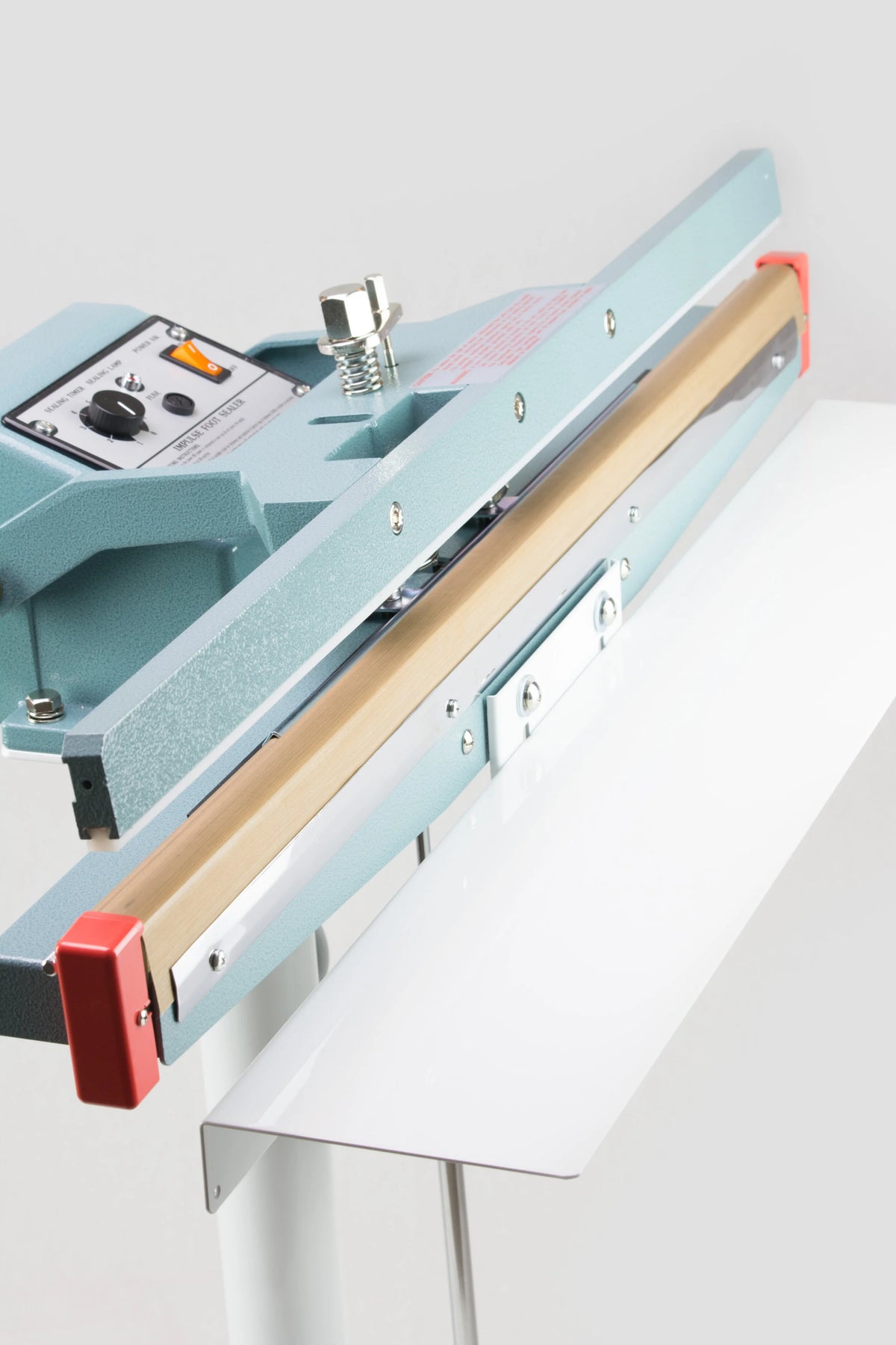 AIE FL Series seal bar and work table, close-up