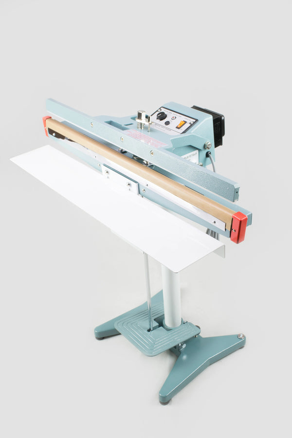 AIE FL Series long impulse foot sealer on stand with work table, angled view