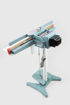 AIE FL Series impulse foot sealer on pedestal stand, rear view
