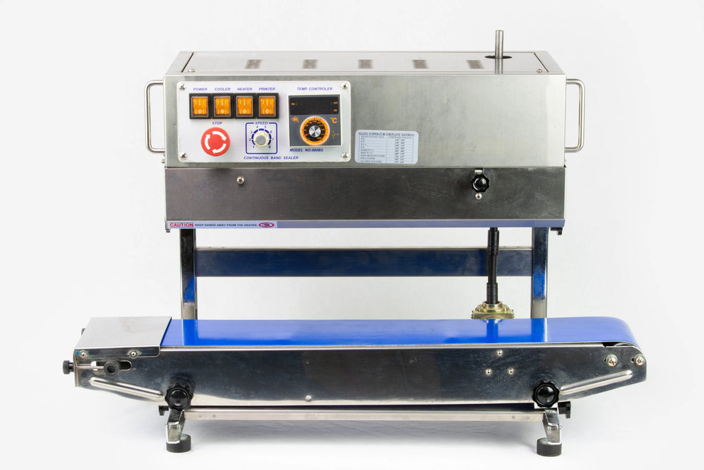 AIE 882BS stainless steel vertical band sealer with raised head and conveyor, front view