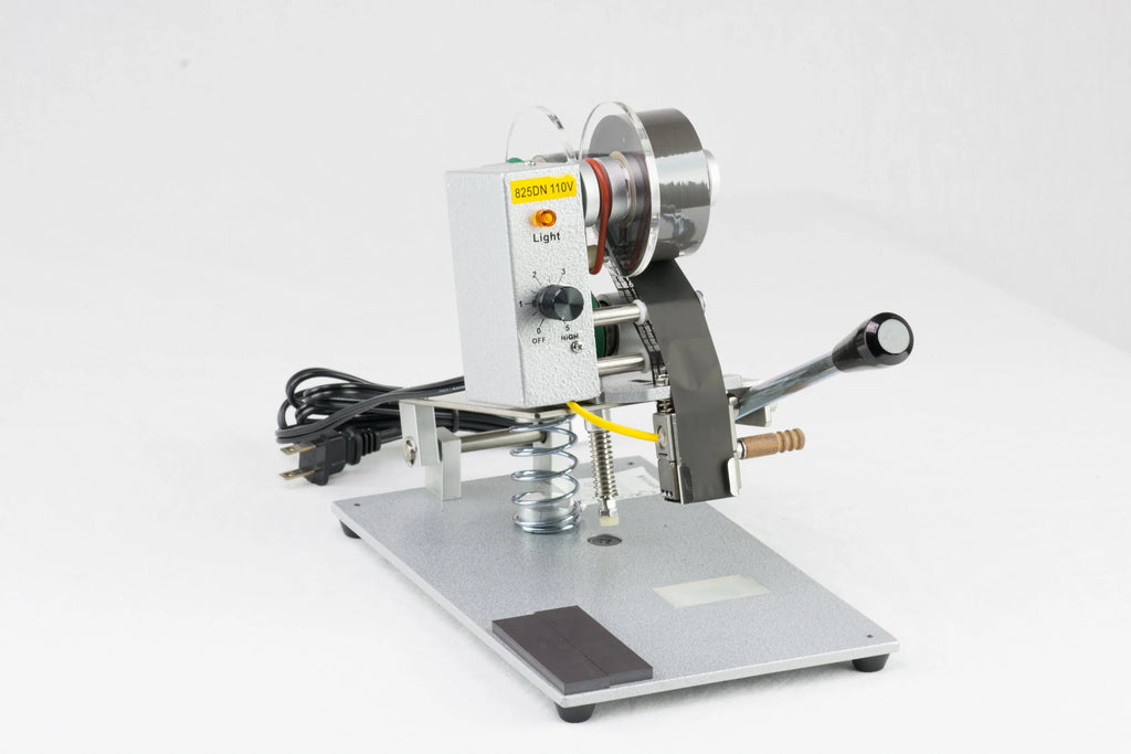 AIE DHH 3-line manual hot stamp imprinter with print foil and lever, three-quarter view