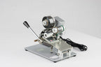 AIE DHH 3-line manual hot stamp imprinter print head and foil rolls, close-up