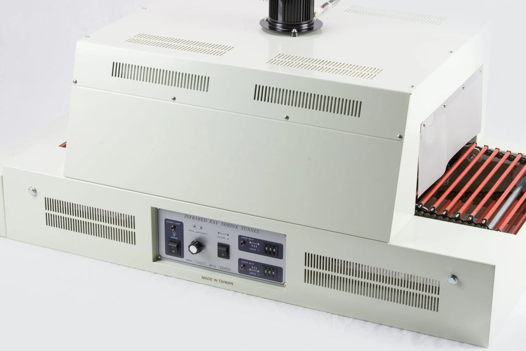 AIE infrared shrink tunnel with control panel and roller conveyor, close-up