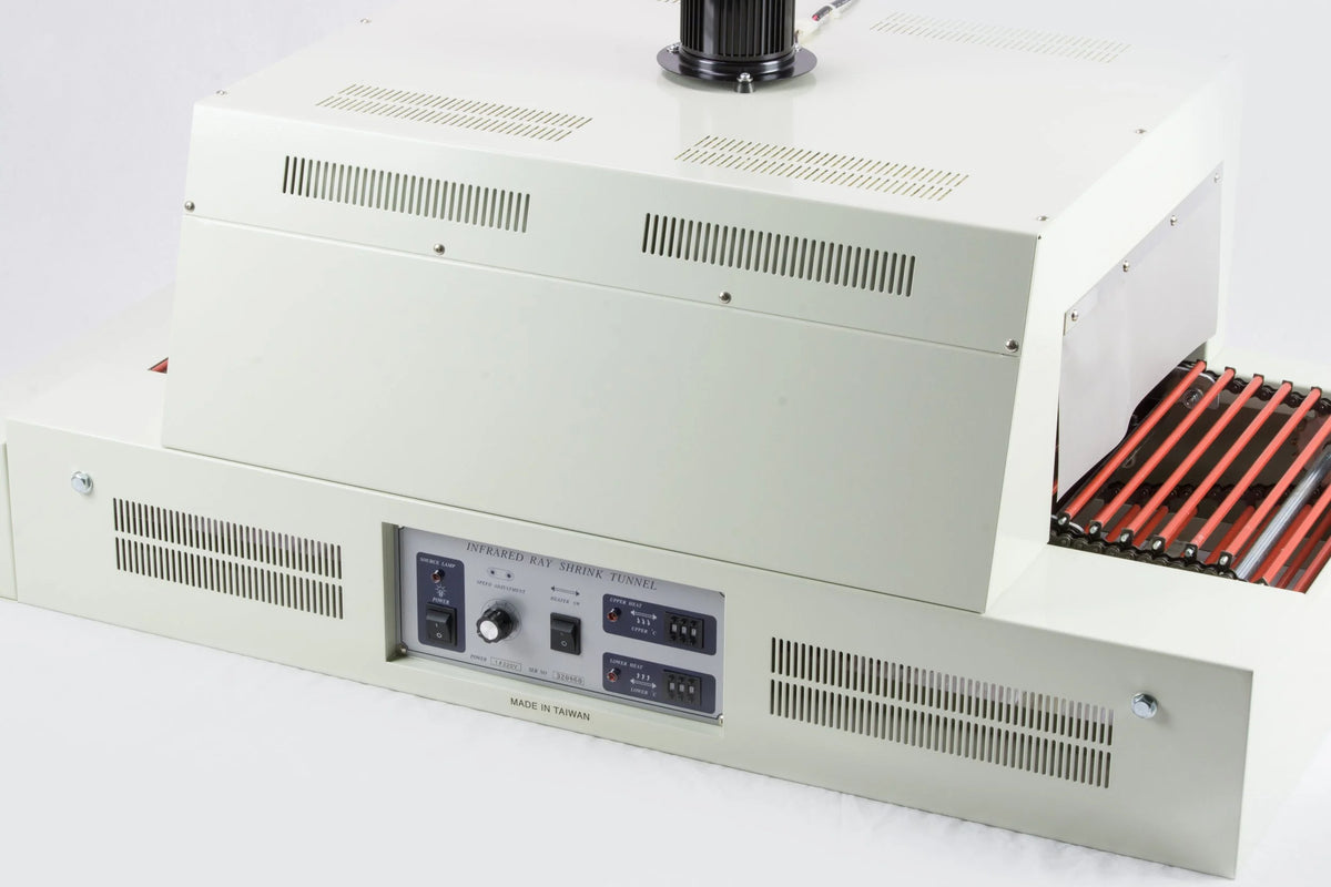 AIE infrared shrink tunnel with control panel and roller conveyor, close-up