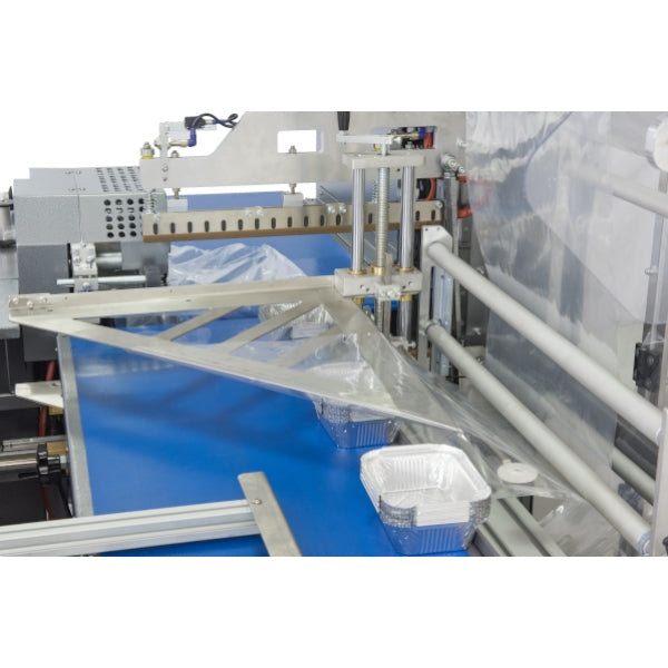 Maripak IMPACK PRO 60 film forming area with a tray on the blue conveyor