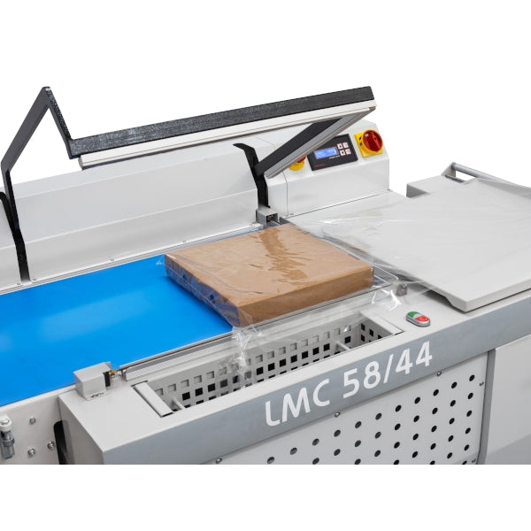 Maripak LMC series semi-automatic L-bar sealer for the LMC 8065-M (LMC 58/44 shown), sealing a carton in film
