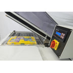 Maripak Compack 5800HC control panel next to the open hood with a boxed product