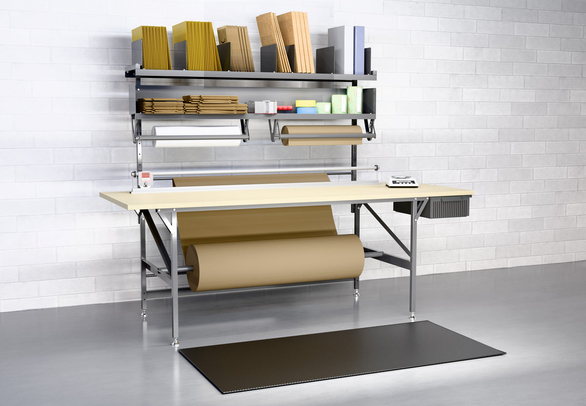 Bulman A670 Deluxe Packing Table, 96″ × 36″ – shown with accessories and packing materials (not included)